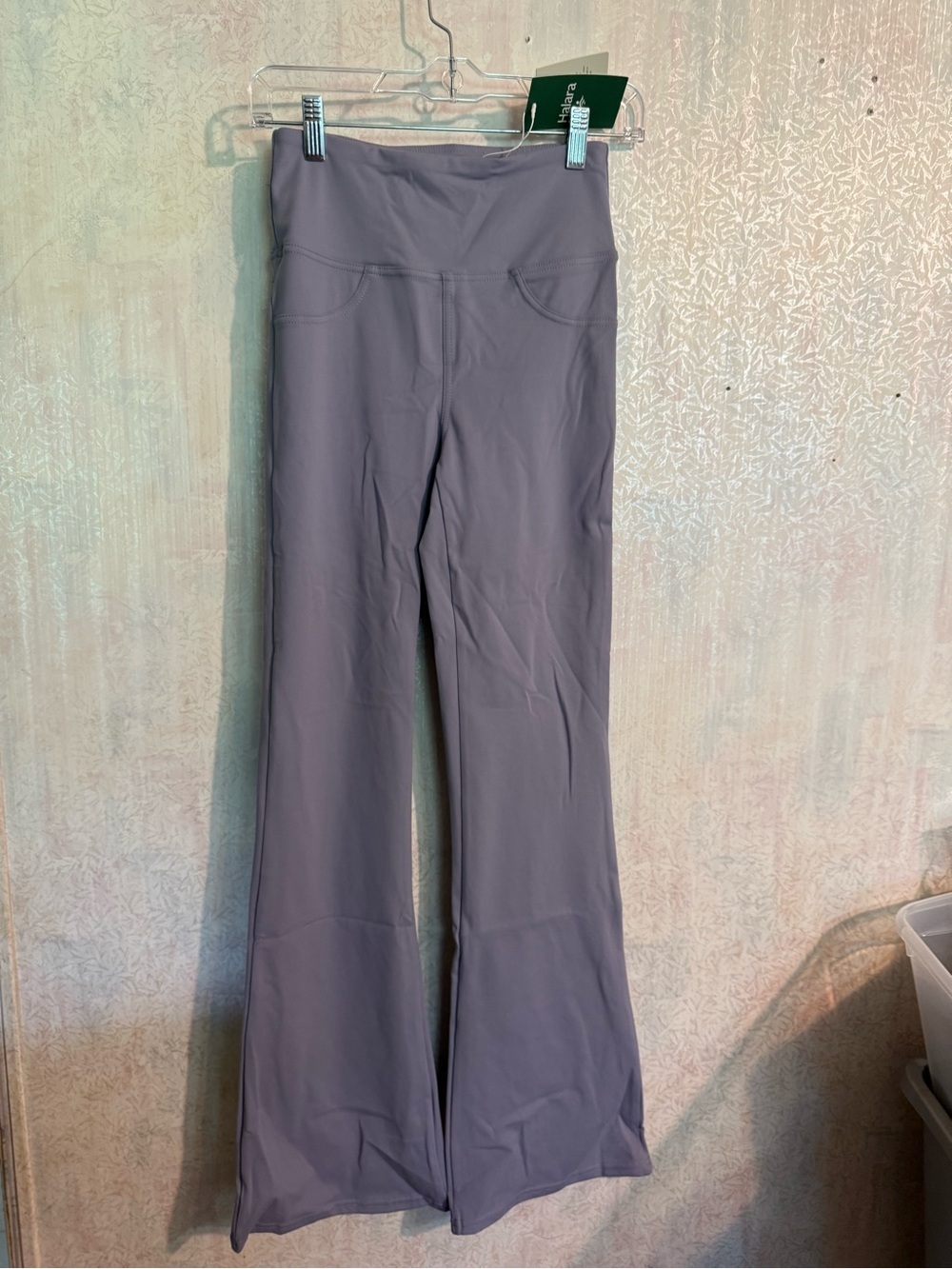 Halara High Waisted Pocket Flare Yoga Leggings‎ in a lavender or purple shade.